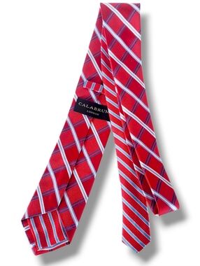 Calabrum London necktie is crafted from 100% silk features a classic red White